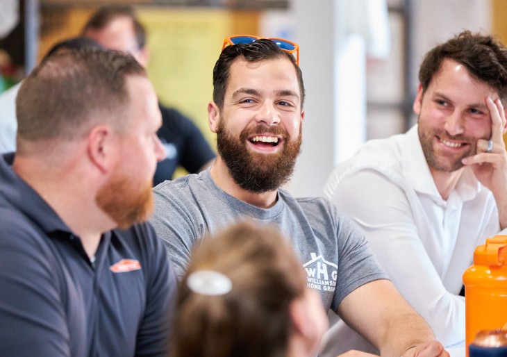 Clarksville Collective members laughing together at a Tuesday morning meeting